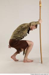 KEETA KNEELING POSE WITH SPEAR